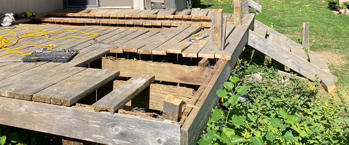 A decking repair project with rotten wood