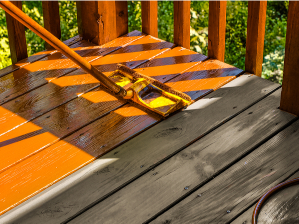 The process of staining a wood deck