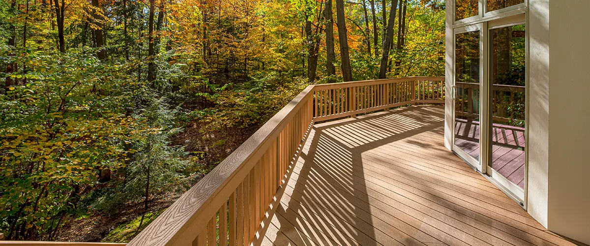 Elevated deck with home and railings