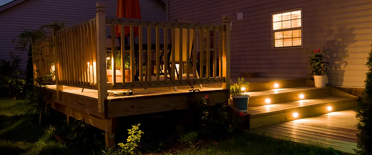 A deck with lights under stairs created in deck design apps