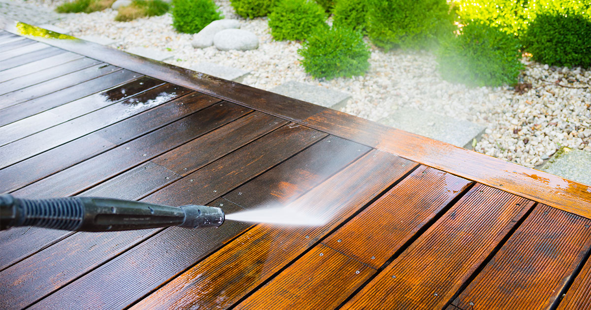 Pressure washing a deck before water seal application