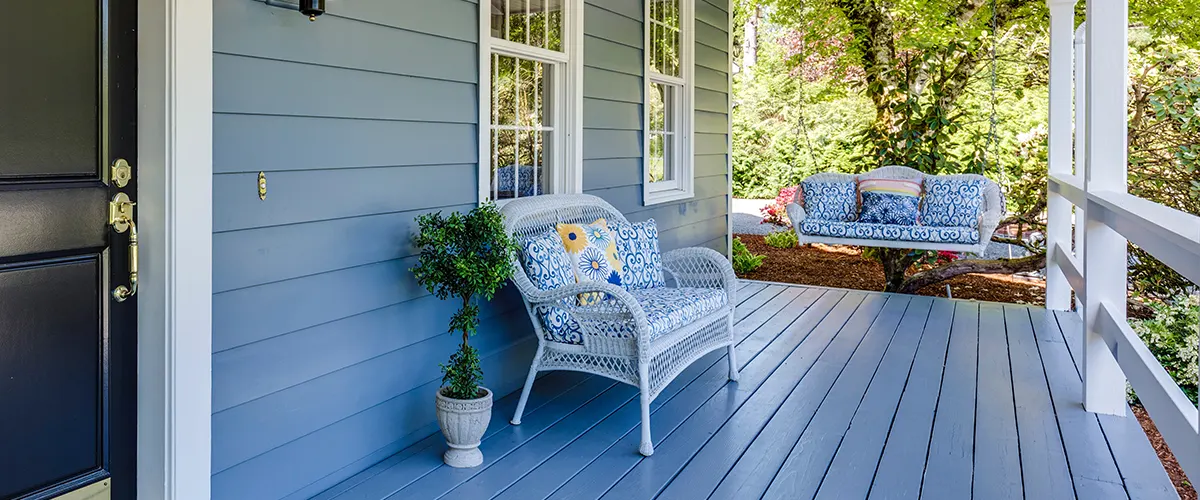 cozy porch with bench and flower pillows