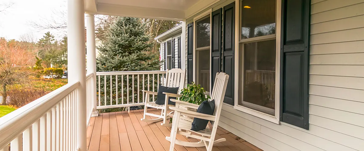 Deck with white rocking chairs