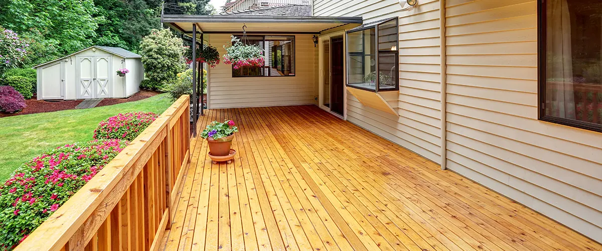 A sealed deck with flowers hanging