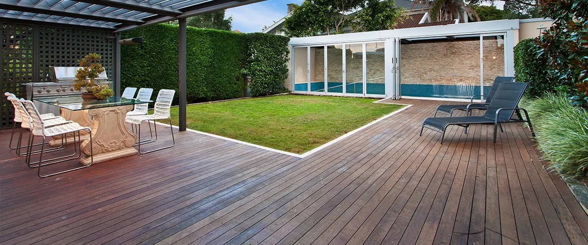 A ground-level deck with wood decking