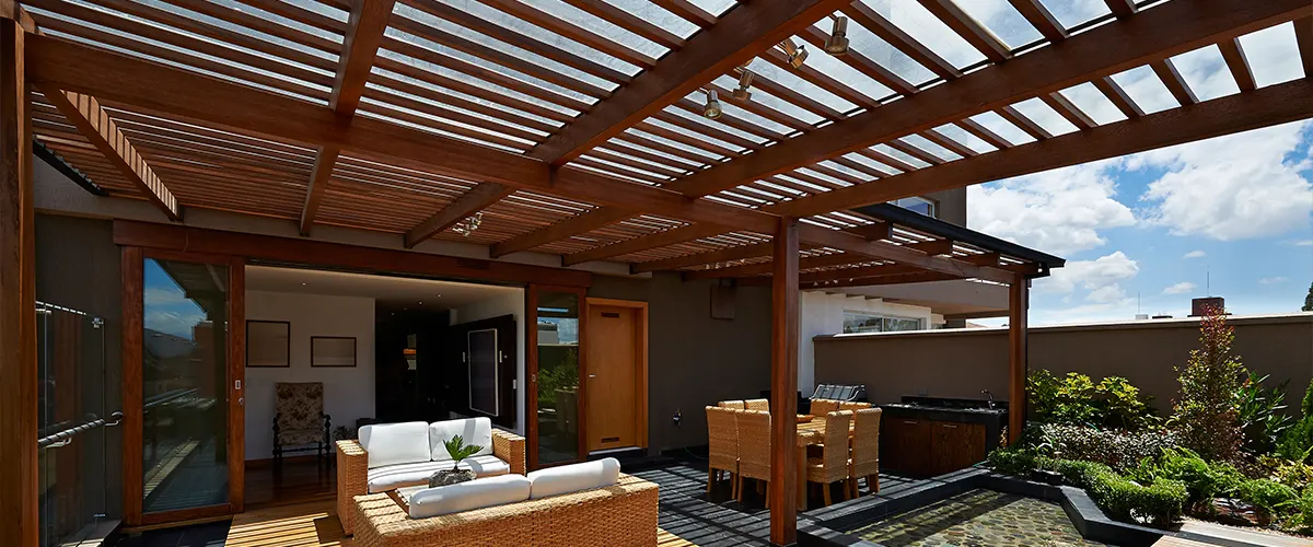 A hefty pergola price because of a custom pergola shape made of redwood