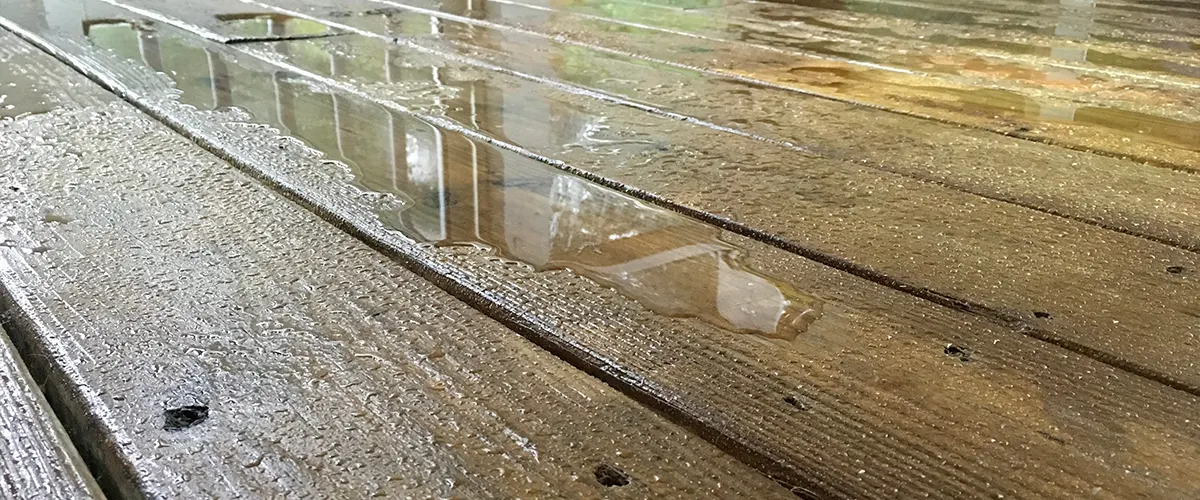 Water on top of wood decking