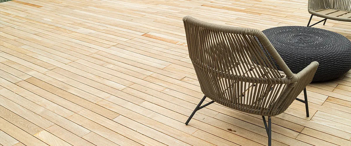 A clear deck with a chair