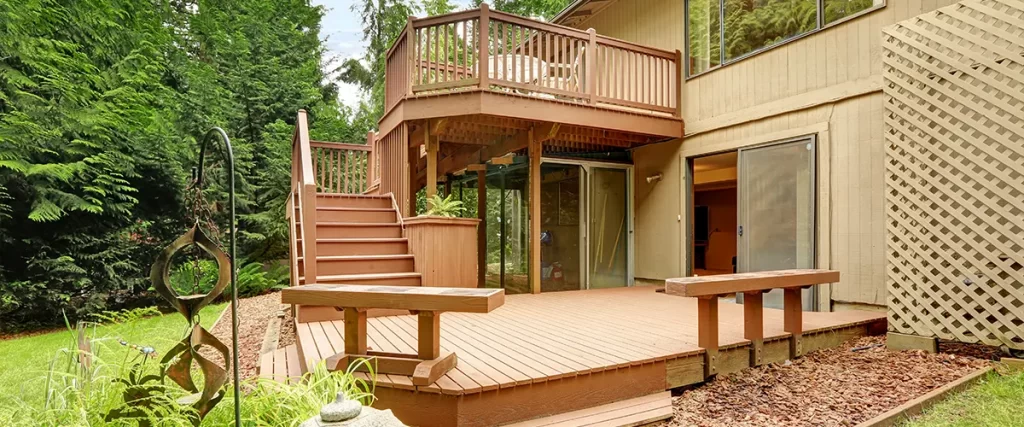 An elevated deck with a set of stairs