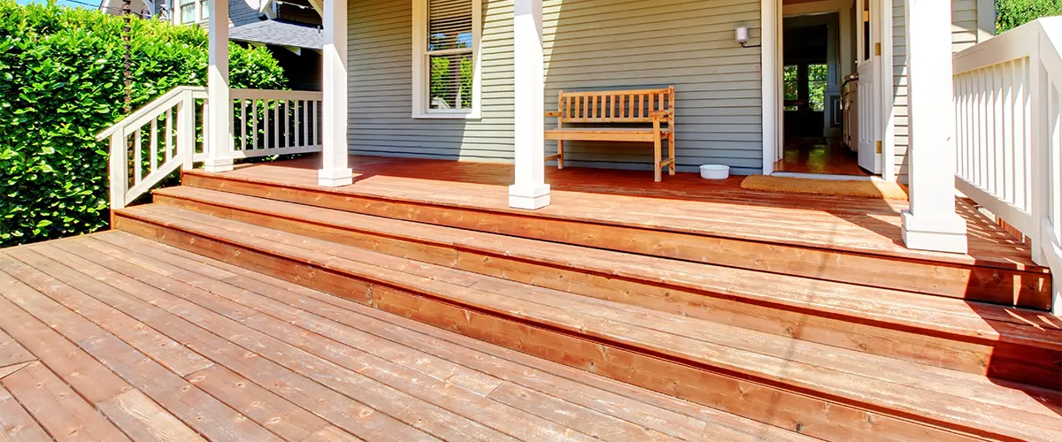An unstained deck with colors fading