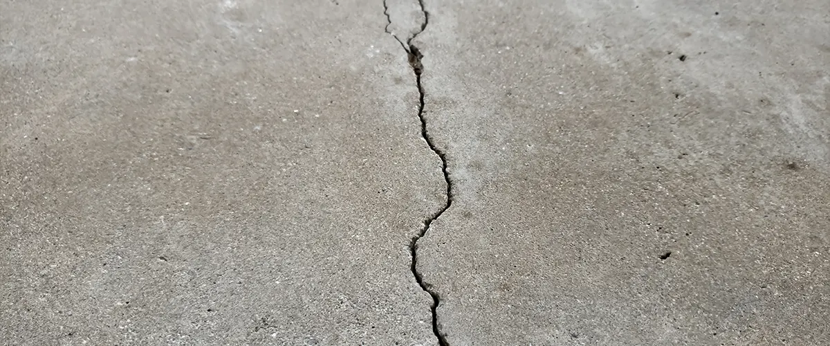 A piece of concrete with a crack right in the middle