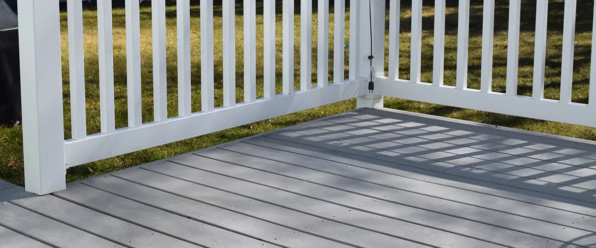 White railings with vinyl deck material