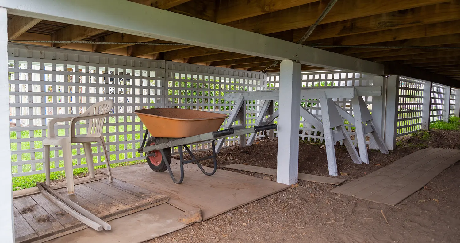 Tools stored under deck with deck skirting