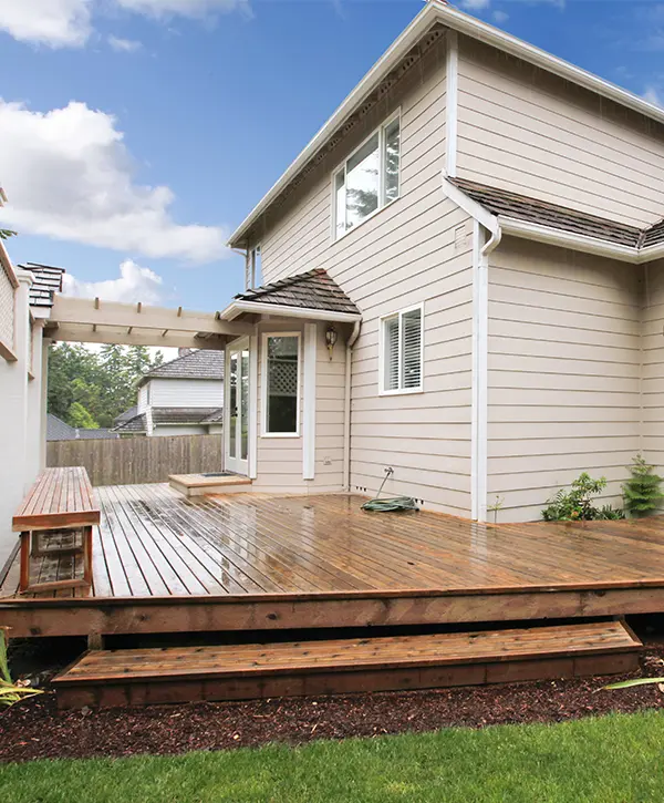 A wood decking wet right after its installation