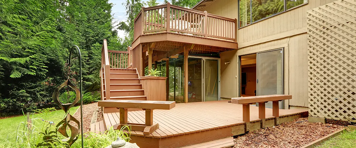 Elevated wood decking with two sets of stairs