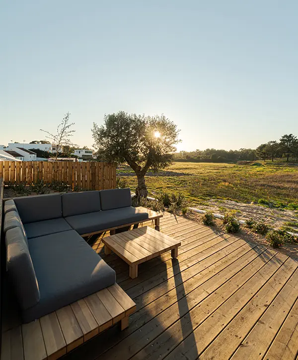 Wood decking with built-in furniture at dawn