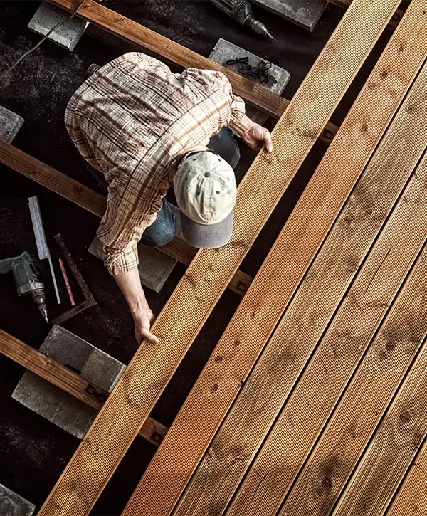 A deck building company in Gretna installing a composite deck