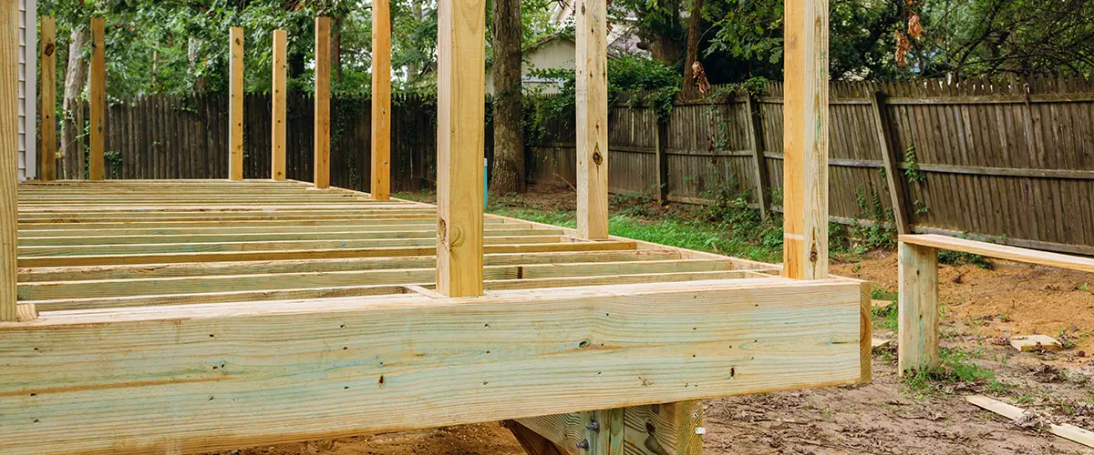 A pressure treated wood deck frame