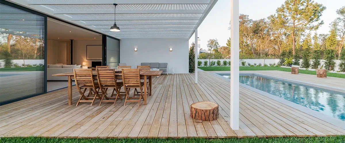 A wood decking around a pool