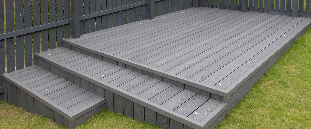 Composite decking material on a ground-level deck