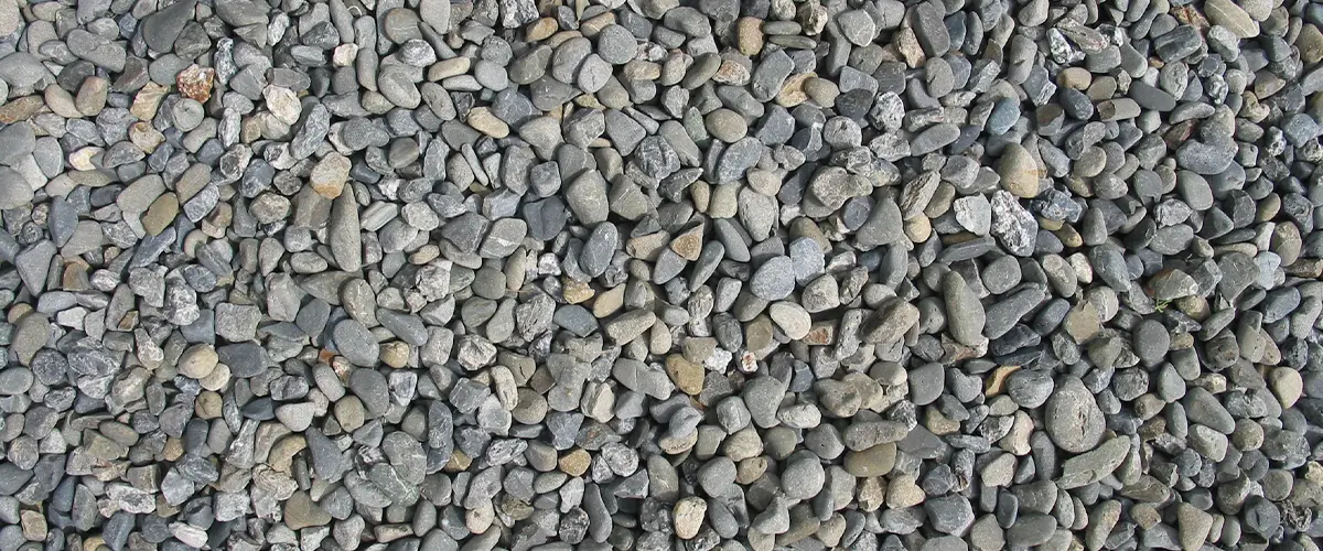 River rocks used under decking to keep it dry