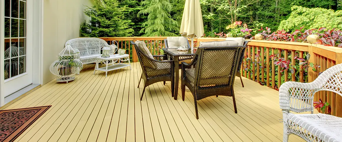 Wood decking with beige stain and outdoor furniture