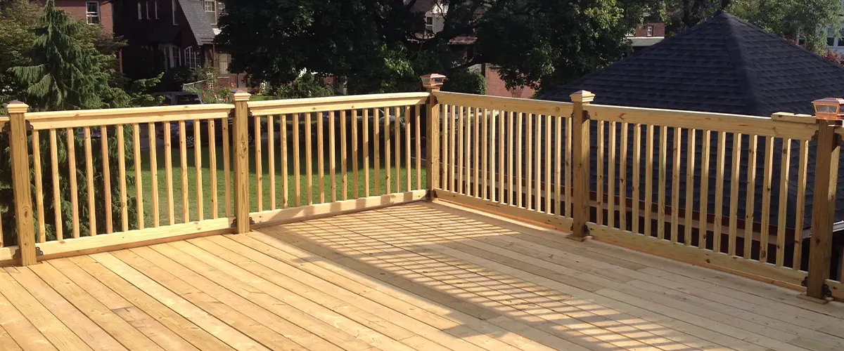 Wood railing on wood decking