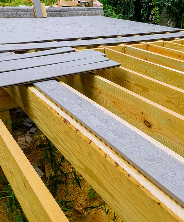 Deck Installation In North Bend, A new wooden, timber deck being constructed. it is on the decking