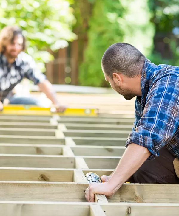 men repairing a deck, deck repairing process with craftsmen