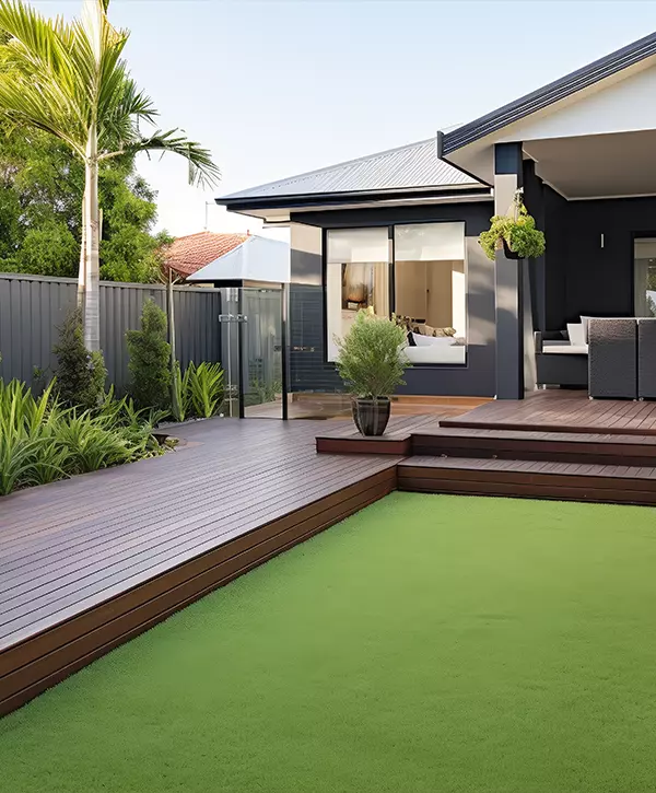 deck repair project after repair, home or residential buildings front yard features artificial grass lawn turf with timber edging