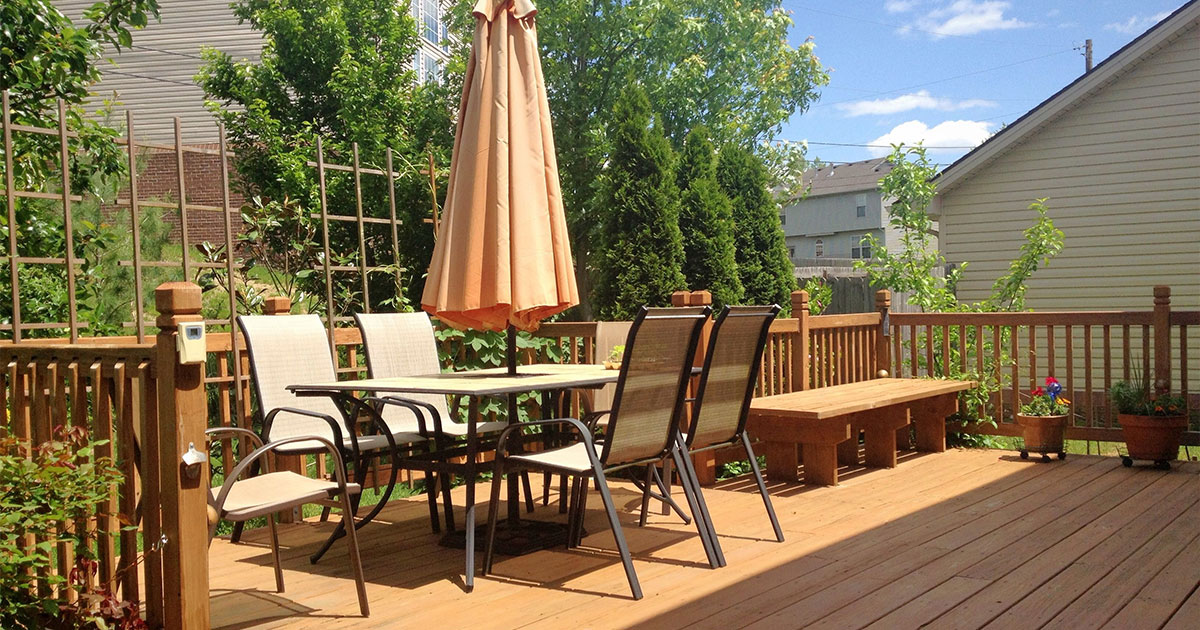 Wooden deck with exterior furniture.