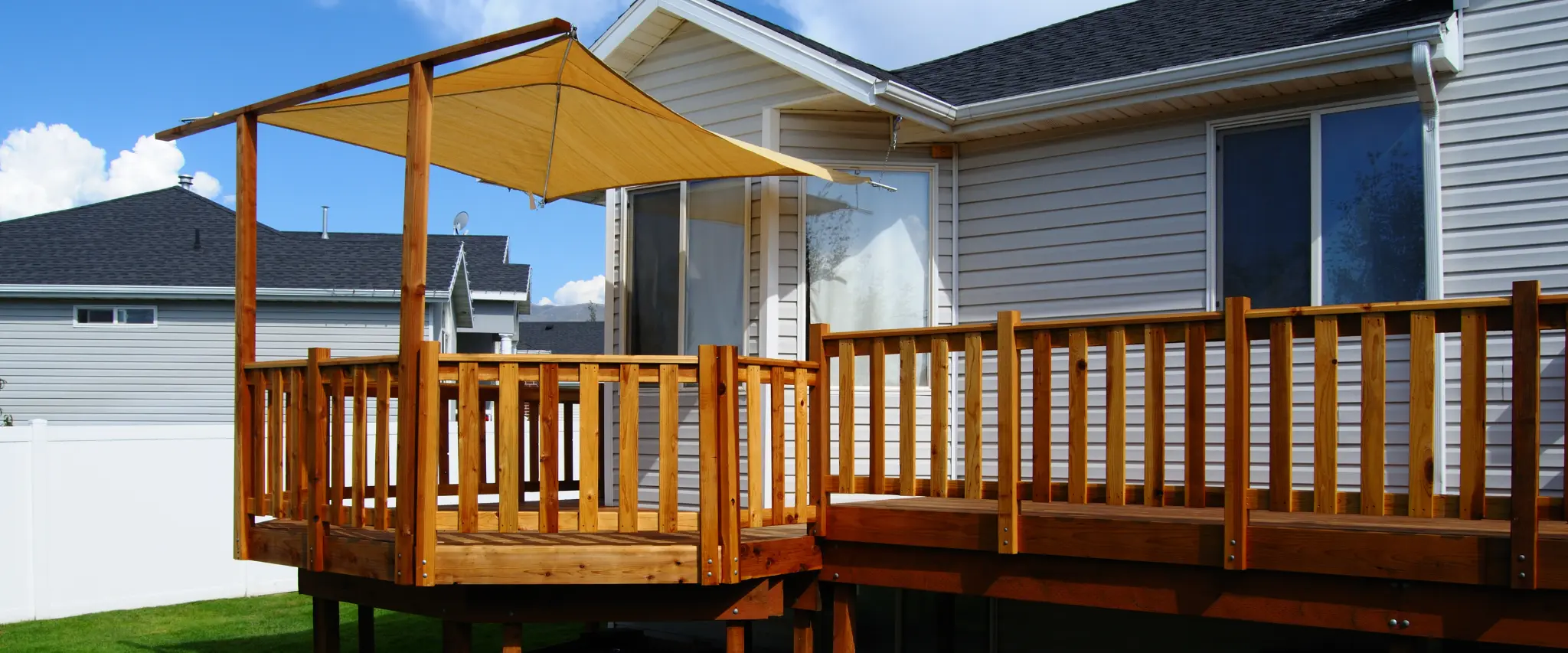 Wooden deck with shaded canopy providing comfort and protection from the sun