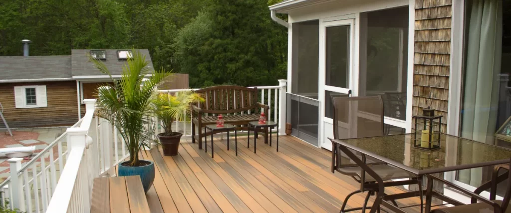 Resurfacing an Old Deck modern deck with white railings and furniture