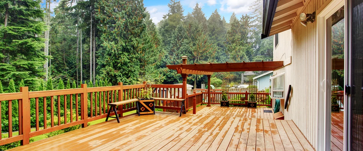 deck waterproofing drainage systems lincoln ne deck building spacious wooden deck with pergola forest view professional construction quality