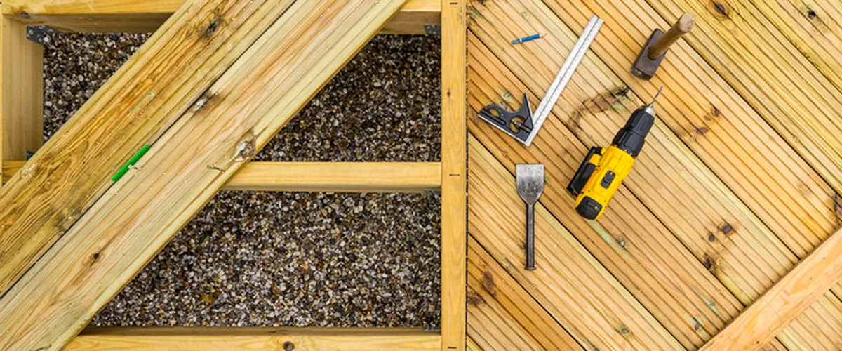 deck waterproofing drainage systems lincoln ne deck building wooden deck construction with professional tools drill clamps square chisel