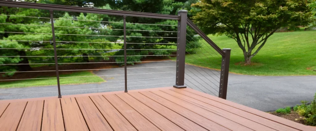 a composite deck with a cable railing system, which is a popular alternative to traditional wood railings