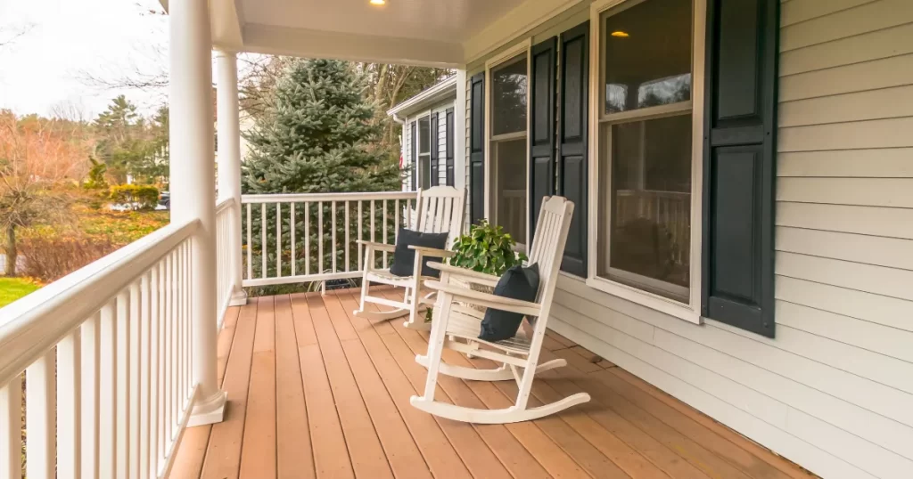 a covered front porch with composite decking