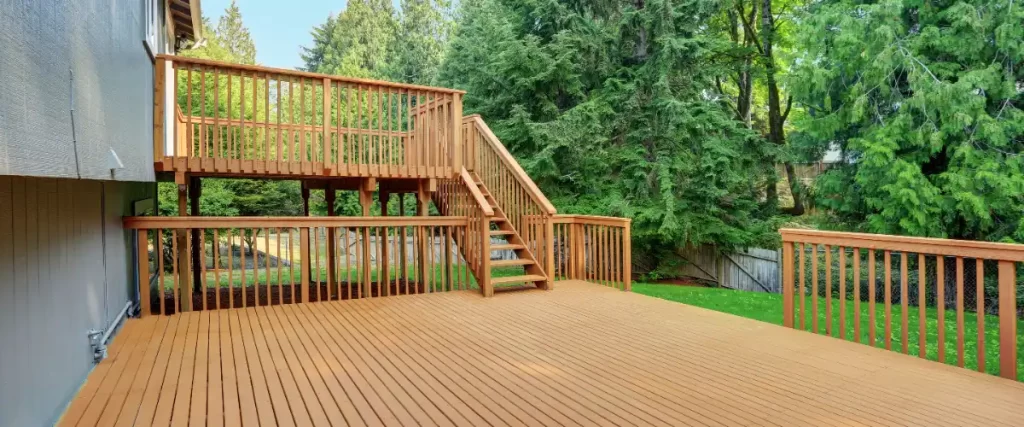 a multi-level deck, an outdoor living space featuring two or more connected platforms built at varying elevations