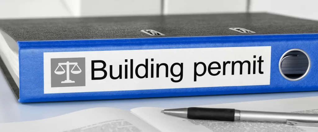 A close-up of an approved residential building permit for a new construction project.