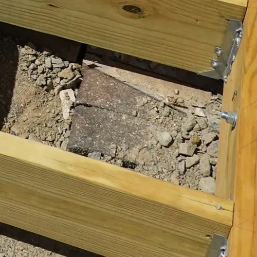 secure joist connection to ledger board under composite decking