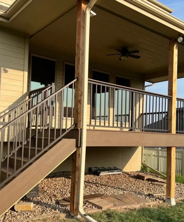 Full composite deck build with stairs and covered deck area in Omaha with Deck Bros